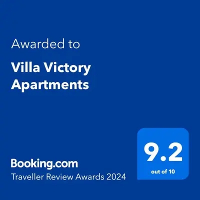 a screenshot of a phone with the text awarded to villa victory apartments at Villa Victory Apartments in Nesebar