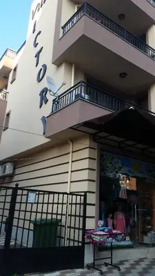 a store front of a building with a balcony at Villa Victory Apartments in Nesebar