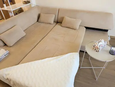 a living room with a couch and a table at Cozy apartment on Sunny Beach in Sunny Beach