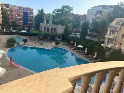 a view of a swimming pool from a balcony at Kalia A7 Sunny Beach in Bŭnzareto