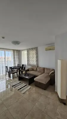 a living room with a couch and a table at PSB Apartments in Etara 2 & 3 Complex Sveti Vlas in Sveti Vlas