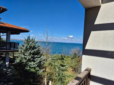 a view of the ocean from the balcony of a house at Eve Santa Marina Sea View Apartment - sea, pools, relax in Sozopol