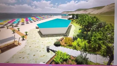 an overhead view of a beach with chairs and umbrellas at Luxurious house Sarafovo beach in Burgas City