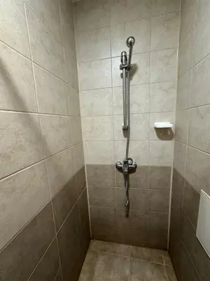 a bathroom with a shower with a toilet at Студио до плажа Свети Влас in Sveti Vlas