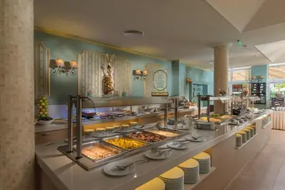 a buffet line with many different types of food at Hotel Miramar Sozopol in Sozopol