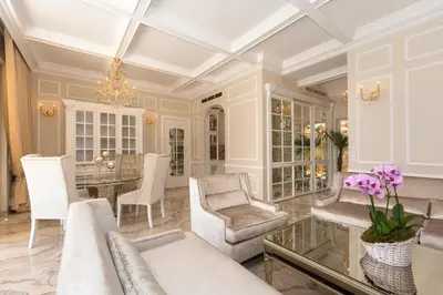 a living room with a table and chairs at Villa Dolce Vita in Sunny Beach