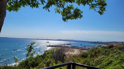 a view of a beach with a boat dock at Dolce Vita 1 Ap-6 in Sveti Vlas
