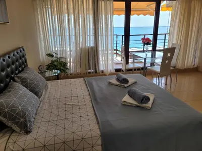 a bedroom with a bed with towels on top of it at Dolce Vita 1 Ap-6 in Sveti Vlas