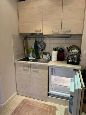 a kitchen with a sink and a counter top at Apartment at the Seaside in Sozopol