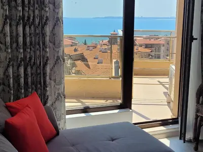 a room with a window with a view of the ocean at Millenium II B34 in Sveti Vlas