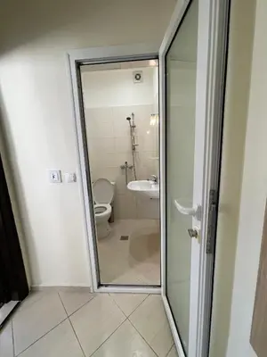 a bathroom with a toilet and a sink at Mila 5 in Burgas City