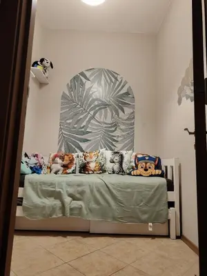 a bed with stuffed animals on it in a room at Grand Kamelia C1 in Sunny Beach