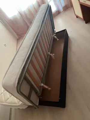 a bunk bed in a room with a mattress at Laguna 3 минуты до моря in Pomorie