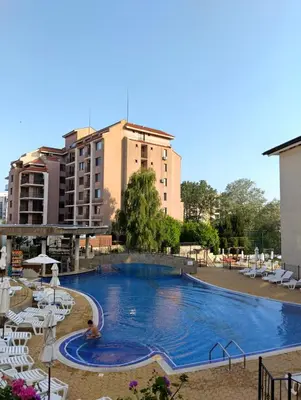 a large swimming pool in front of some buildings at Отдых in Sunny Beach