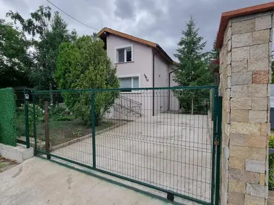 a fence in front of a house at Relax & Spa-House near Therma Numera in Burgas City