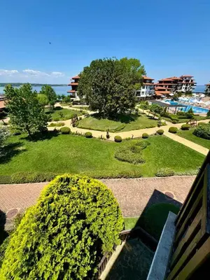 a view of a park with trees and bushes at Complex Gallery Saint Thomas in Sozopol