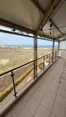 an empty room with a view of the ocean at Apartment Zornitsa I Panoramic Sea View in Sozopol