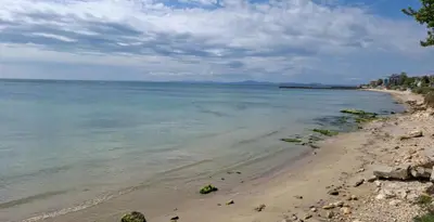 a view of the beach from the shore at РАВДА Лазур Аурелия in Ravda