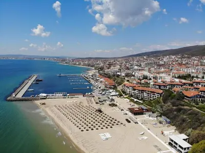 an aerial view of a beach with a harbor at Ela, Kedar 3 in Sveti Vlas