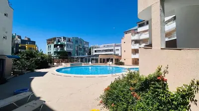 a swimming pool in the middle of a building at ATOS 507 Studio Sunny Beach in Sunny Beach