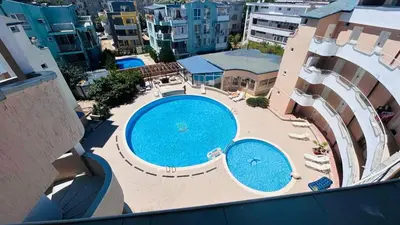 an overhead view of a swimming pool on a building at ATOS 507 Studio Sunny Beach in Sunny Beach