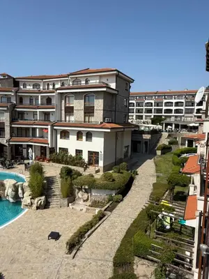 an aerial view of a building with a swimming pool at Vineyards Resort, Aheloy - Studio 32 in Pomorie