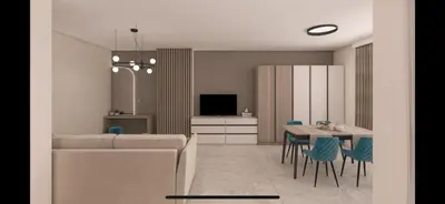 a living room with a couch and a table with chairs at Sorento Sole Mare in Sveti Vlas
