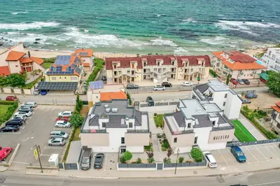 an aerial view of a town next to the ocean at BellaViaStay, Flat Apolonia 1BD in Burgas City