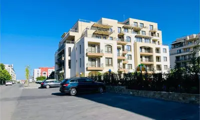 a car parked in front of a building at Sorrento E 4 4 Sveti Vlas in Sveti Vlas