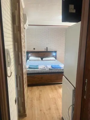 a small room with a bed in a small room at Studio Vili 2 in Varna City