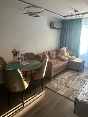 a living room with a couch and a table at Sea Home 9 in Sunny Beach