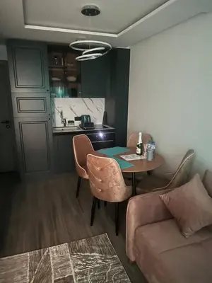 a living room with a table and a couch at Sea Home 9 in Sunny Beach