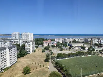an aerial view of a city with a soccer field at Sunrise home in Burgas City