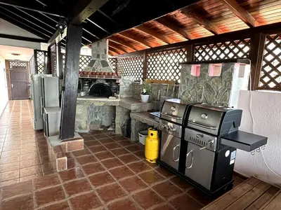 a kitchen with two burners and a stove at Luxury 3-BR apartment & sky terrace in Sveti Vlas