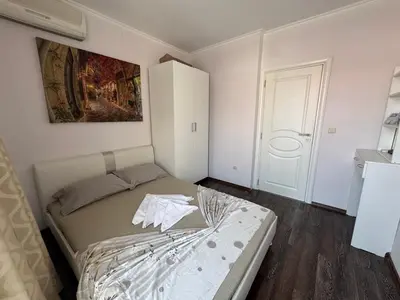 a bedroom with a bed and a painting on the wall at VP Villa Valencia in Sunny Beach