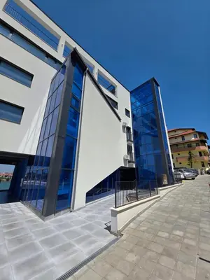 a building with an open door on a street at Магията на Созо in Sozopol
