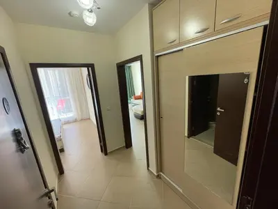 a hallway of a house with a door to a room at Sun and Sea A22 in Sunny Beach