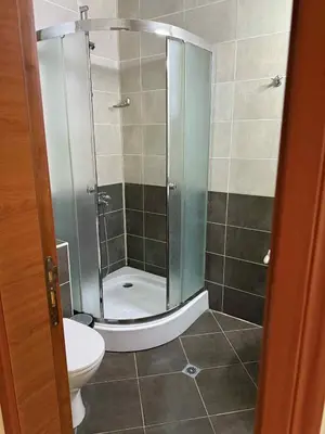 a bathroom with a shower and a toilet at Ravda14 in Ravda