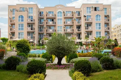 a large apartment building with a garden in front of it at Marea Garden, Ravda - Studio with Pool by Flat Mаnager in Ravda