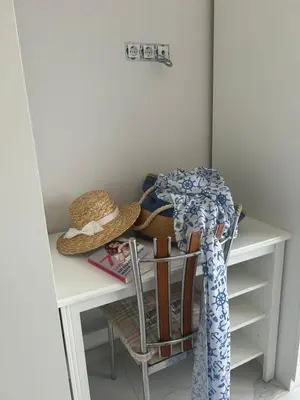a desk with a hat on top of it at On the beach 7 in Sozopol