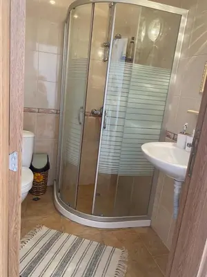 a bathroom with a shower and a sink at Sunny Byala in Byala