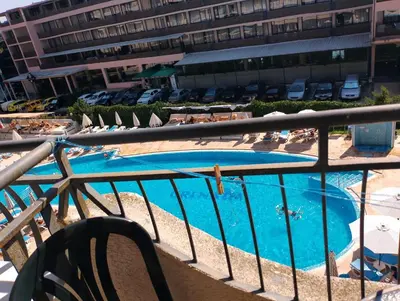 a view of a pool from the balcony of a hotel at Jolka in Sunny Beach
