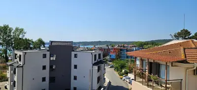 an aerial view of a city with buildings at Cozy sea view studios in Sozopol