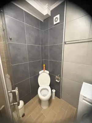 a small bathroom with a toilet in a stall at Flat in Cascadas 21 in Sunny Beach