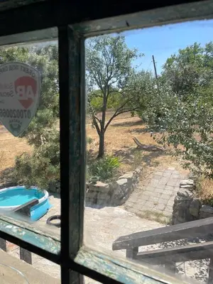 a view of a pool from a window at Villa Suhodol