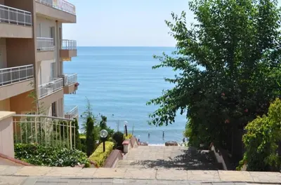 a view of the ocean from a building at Rooms Ivanka Ground Floor in Obzor