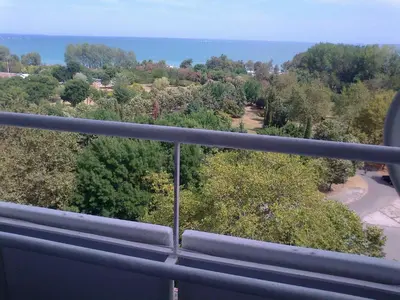 a view of the ocean from a balcony at Hotel Park in Burgas City