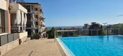 a swimming pool on the side of a building at Apartment Sofia Macon Residence Sveti Vlas in Sveti Vlas
