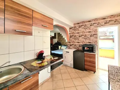 a kitchen with a sink and a counter top at Sea Star Studio-to the Sea Garden in Burgas City