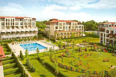 an aerial view of a park with a playground at Green life private garden studio in Sozopol